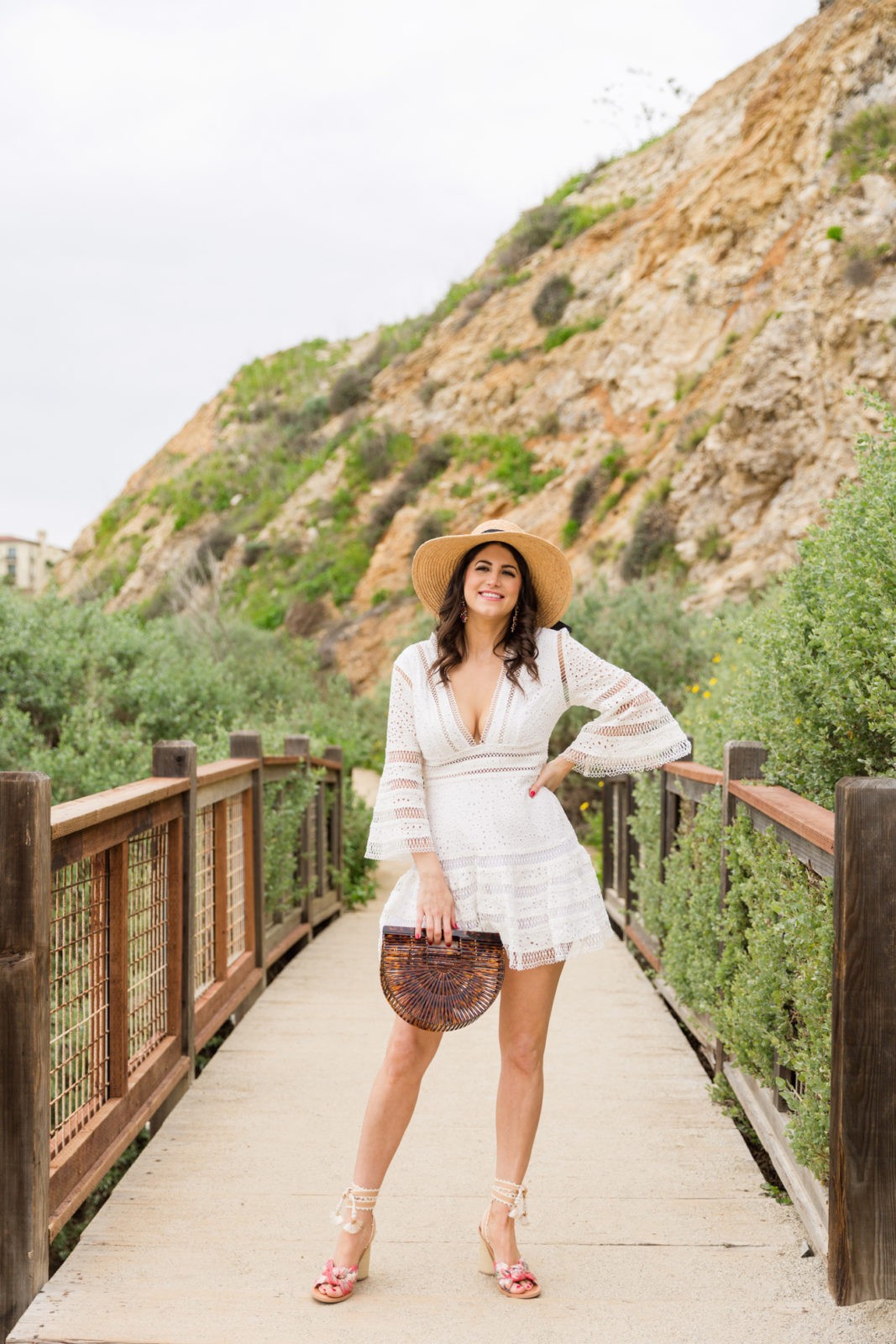 https://www.lauralily.com/wp-content/uploads/2019/03/Red-Dress-Boutique-White-Eyelet-Dress-Resort-Wear-Outfits-by-Fashion-Blogger-Laura-Lily-2.jpg